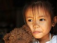 child with teddy